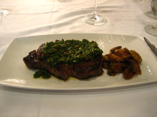 18-Oz Rib-eye with potatoes Lyonnaise and salsa verde 