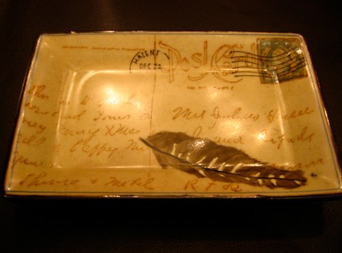 The bill at Sepia comes on one of these postcard trays