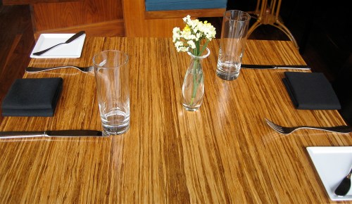 Love the birch trees affixed in the center of the dining room