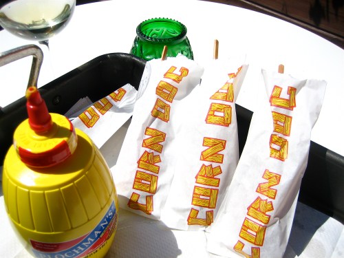 Hand-dipped corn dogs on the patio at Juicy